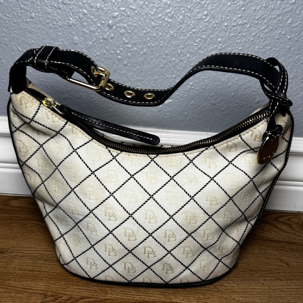 Dooney and Bourke women’s Cream and Black Canvas Monogram Hobo Handbag